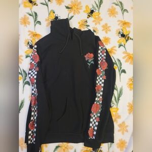 Rue21 black hoodie with roses on arms and front right chest